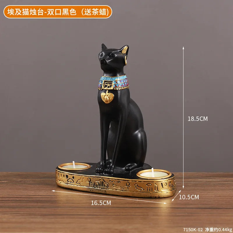 Statue and candlestick of the Egyptian cat goddess Bastet.