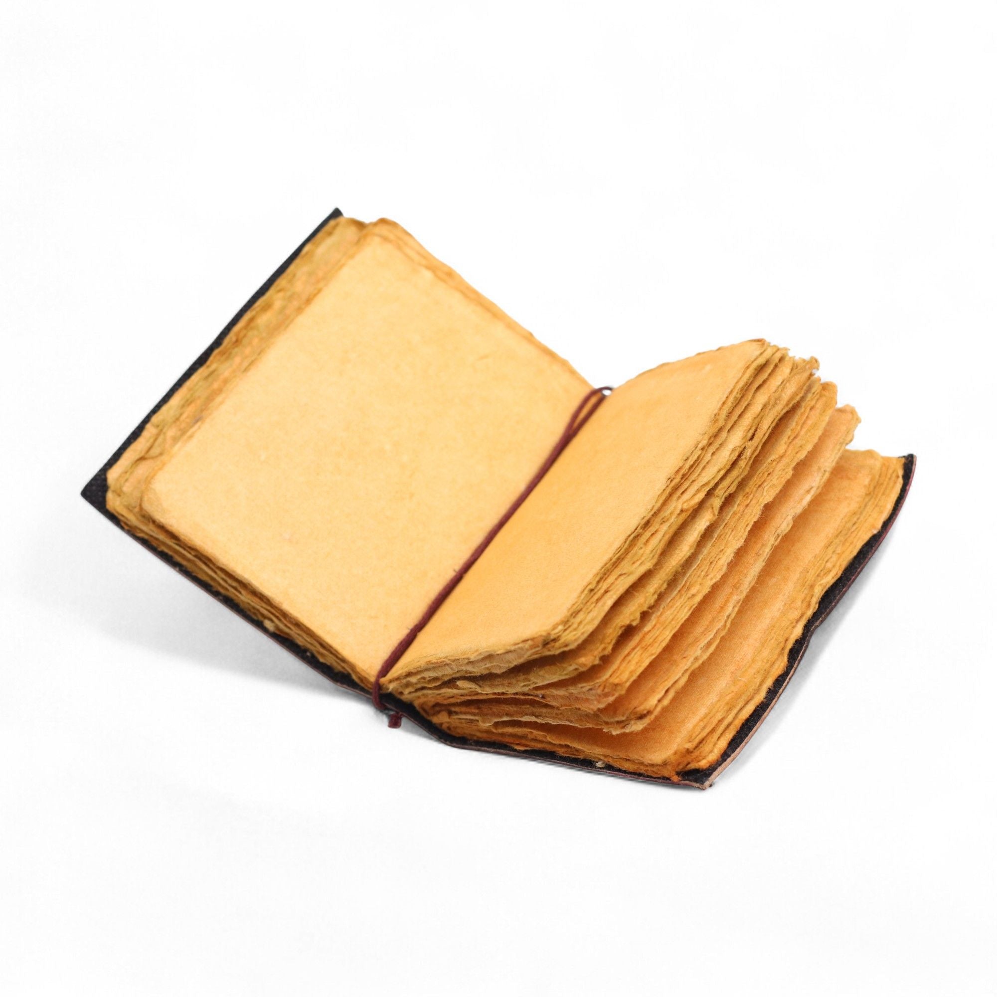 Caderno de couro grosso com borda desfiada – "Nem todos os dias são bons"